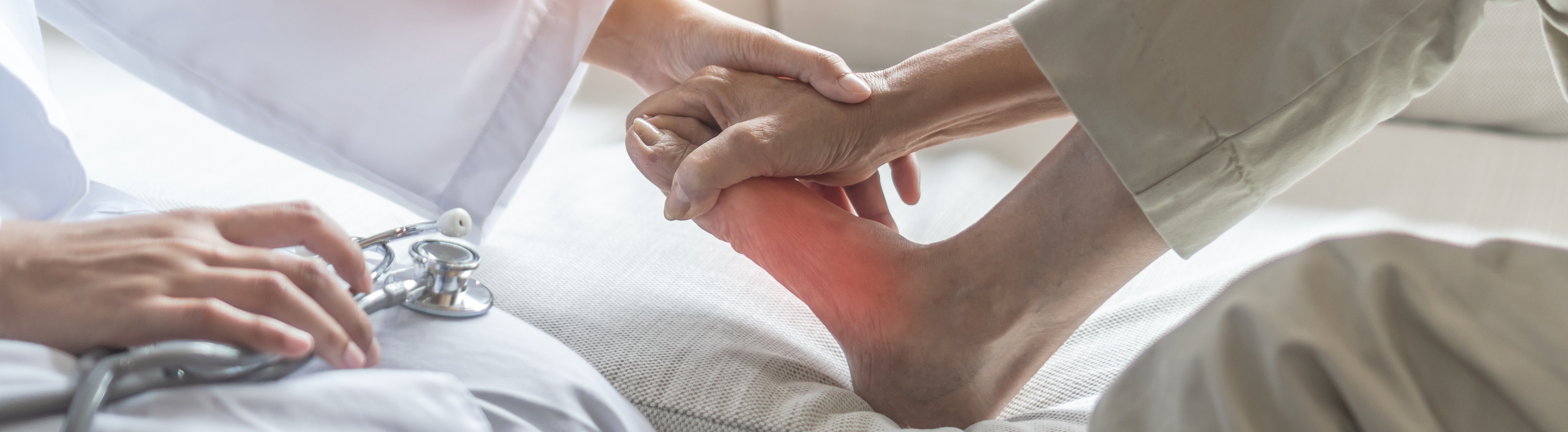 Doctor examining foot pain